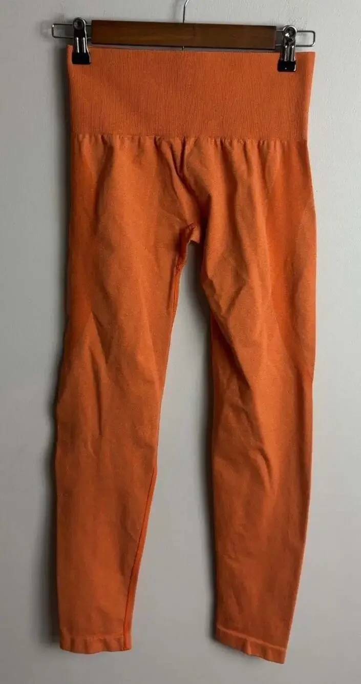 NVGTN Seamless High Waisted Leggings Size Medium Orange Athletic Gym Women’s